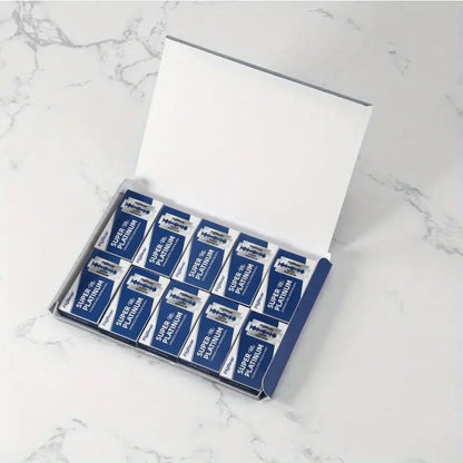 Group of 20 small packs containing 5 blades each, totaling 100 premium razor refills.