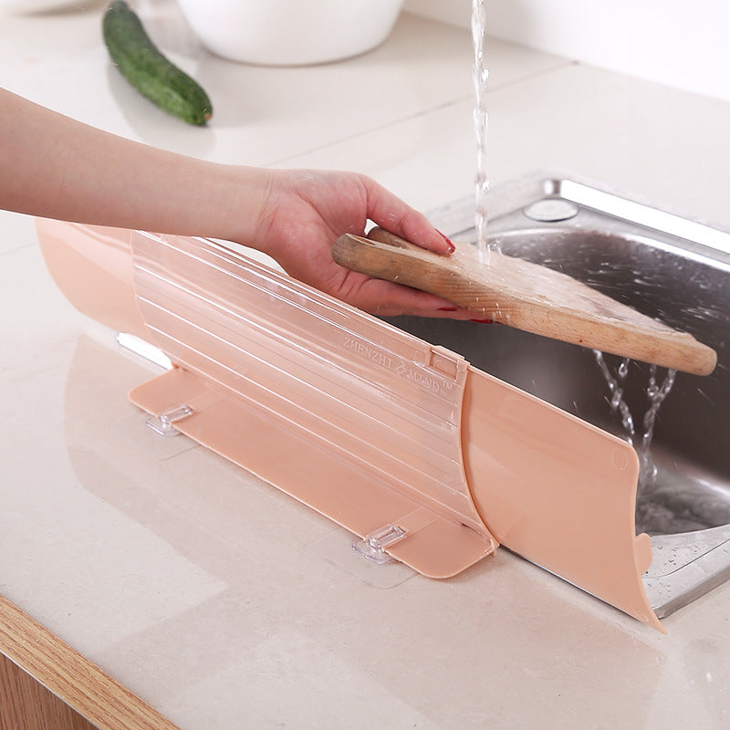 Splash-Proof Sink with Retractable Splash Guard