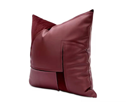 The reverse side features smooth, matte burgundy faux leather for a modern contrast.