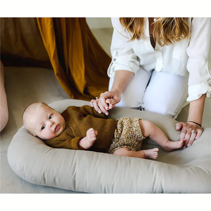 The perfect baby shower gift: a stylish and functional bionic nest for newborn boys or girls.