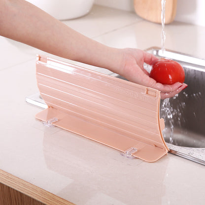 Splash-Proof Sink with Retractable Splash Guard